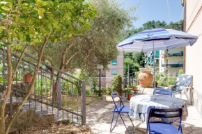 Splendido appartamento con giardino e 3 posti auto